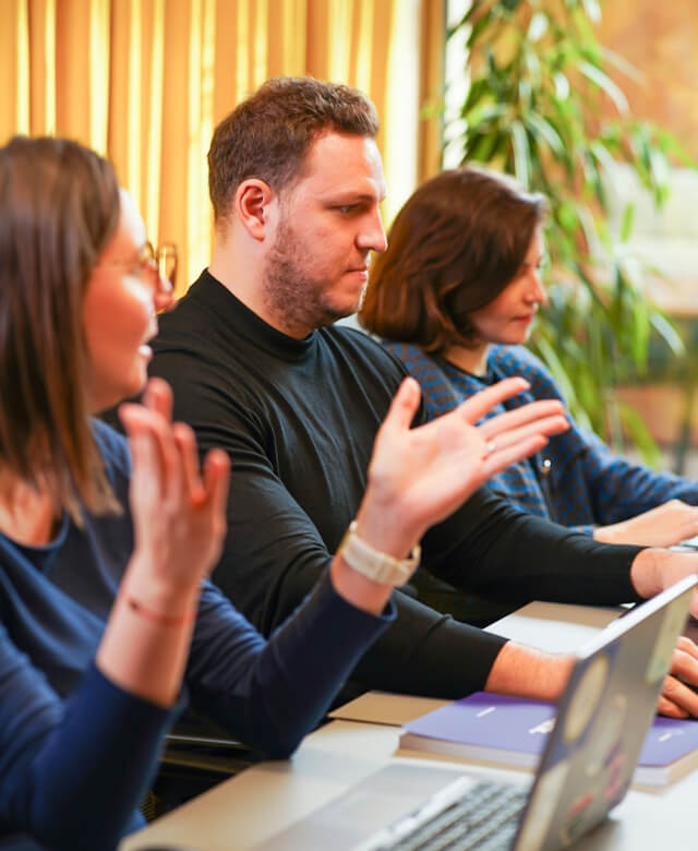Staff reviewing supporting documents